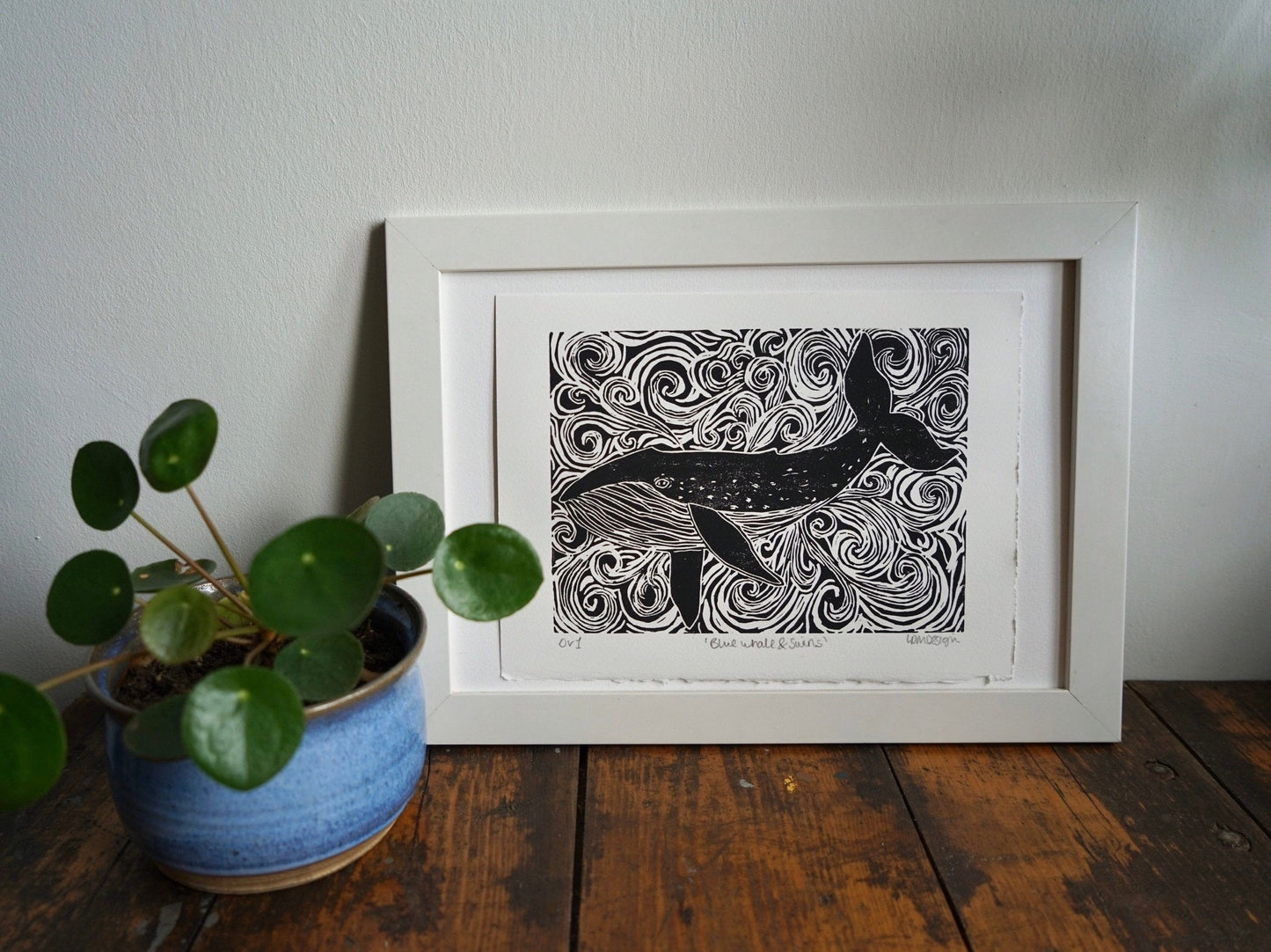 Original Linocut print of ‘Blue Whale & swirls’.