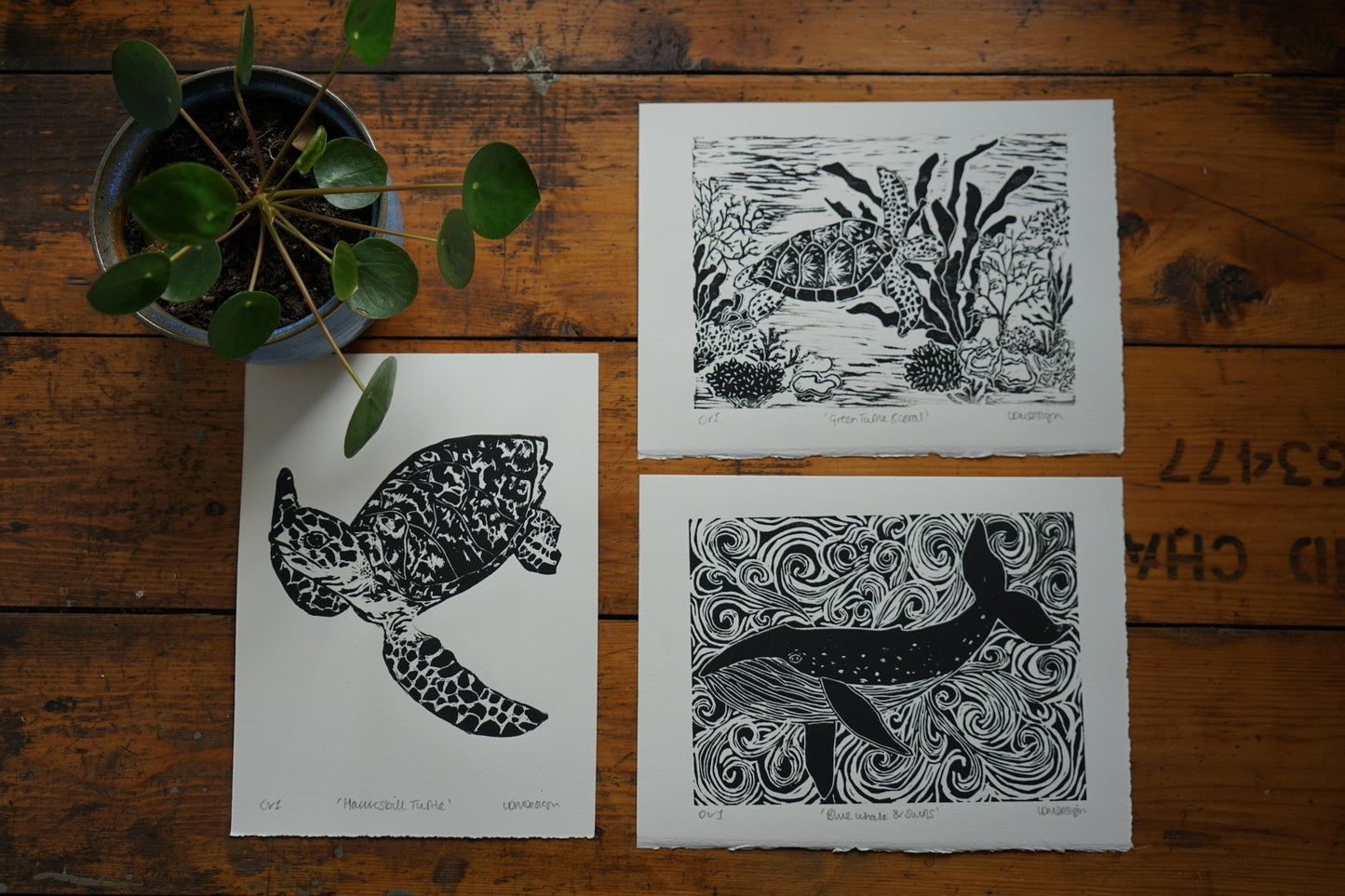 Original Linocut print of ‘Blue Whale & swirls’.