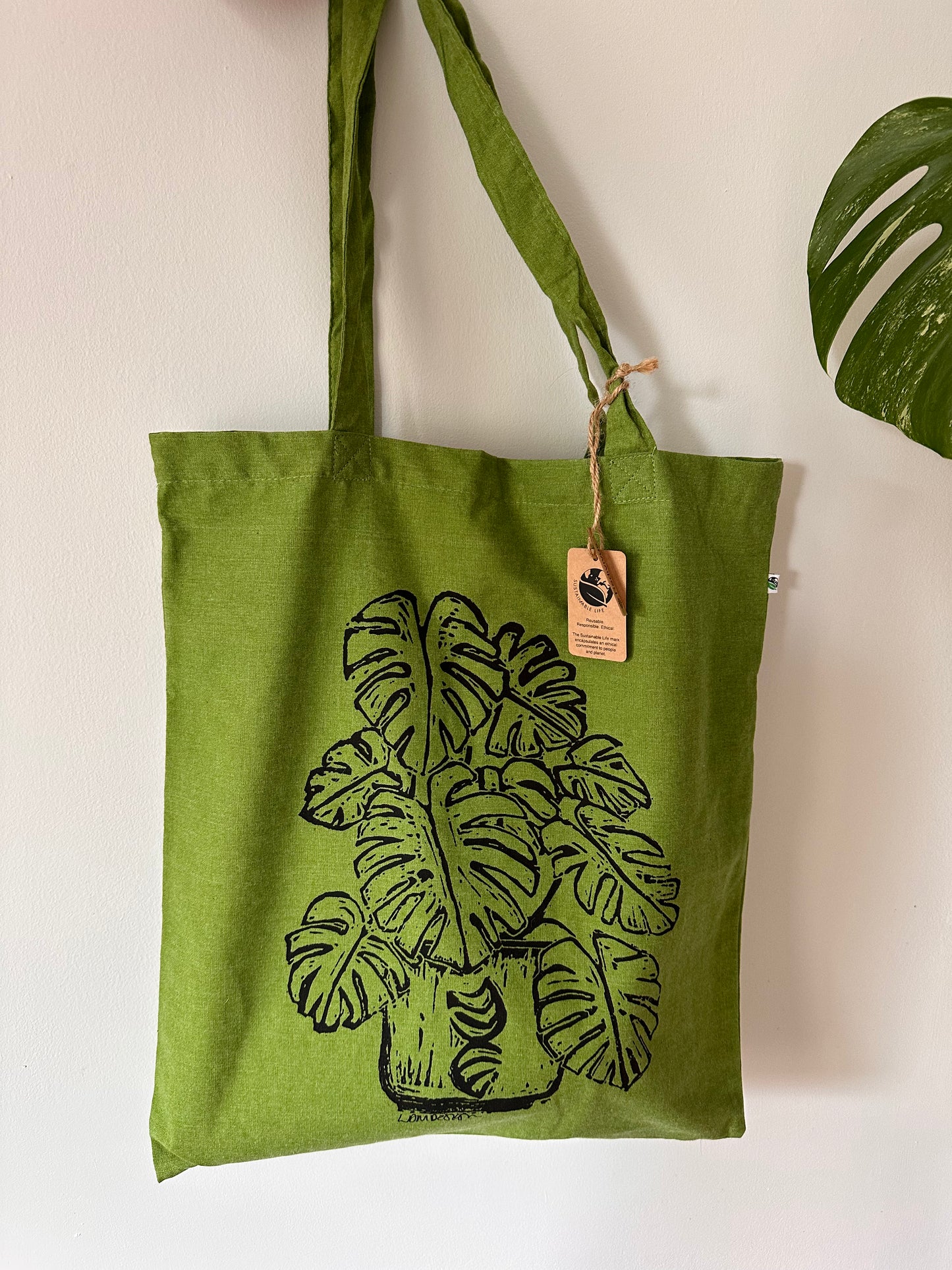 Eco-Friendly recycled plastic RPET Monstera Deliciosa tote bag.