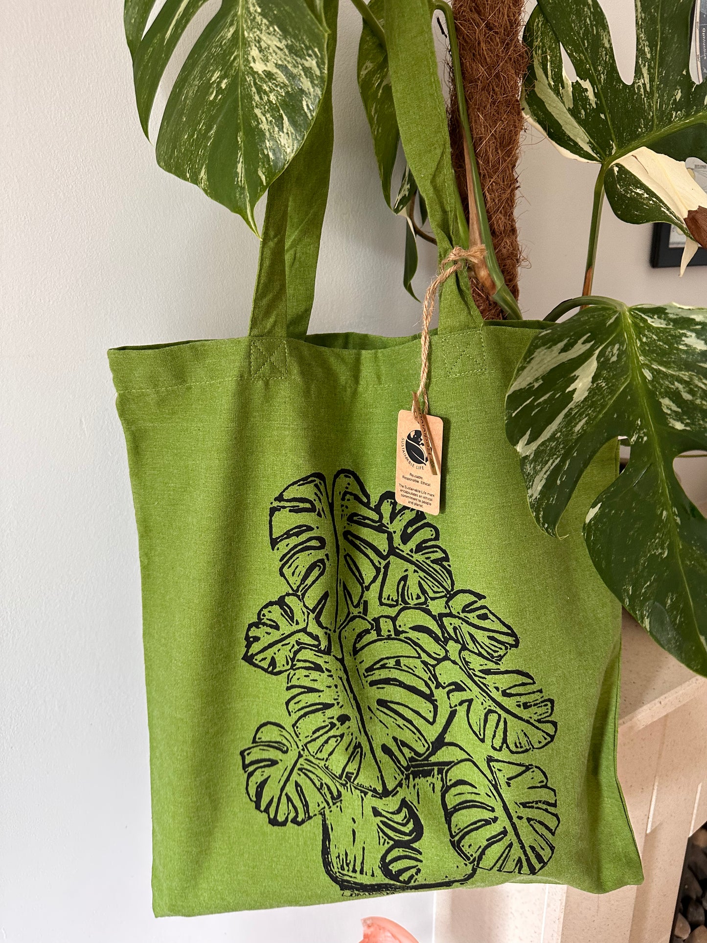 Eco-Friendly recycled plastic RPET Monstera Deliciosa tote bag.