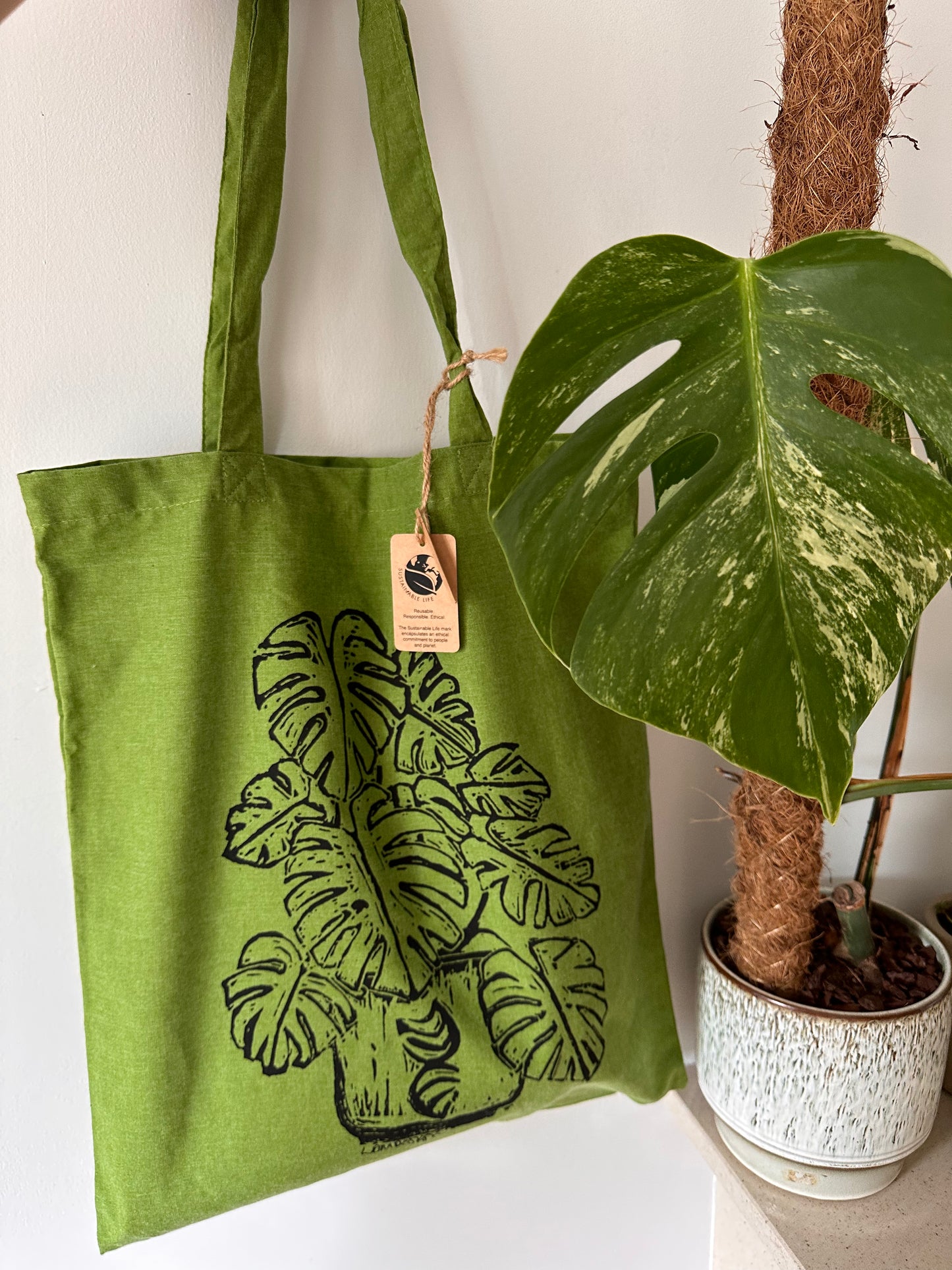 Eco-Friendly recycled plastic RPET Monstera Deliciosa tote bag.