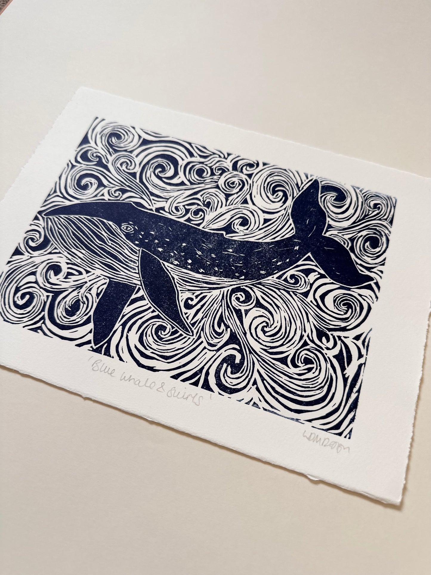 Original Linocut print of ‘Blue Whale & swirls’.