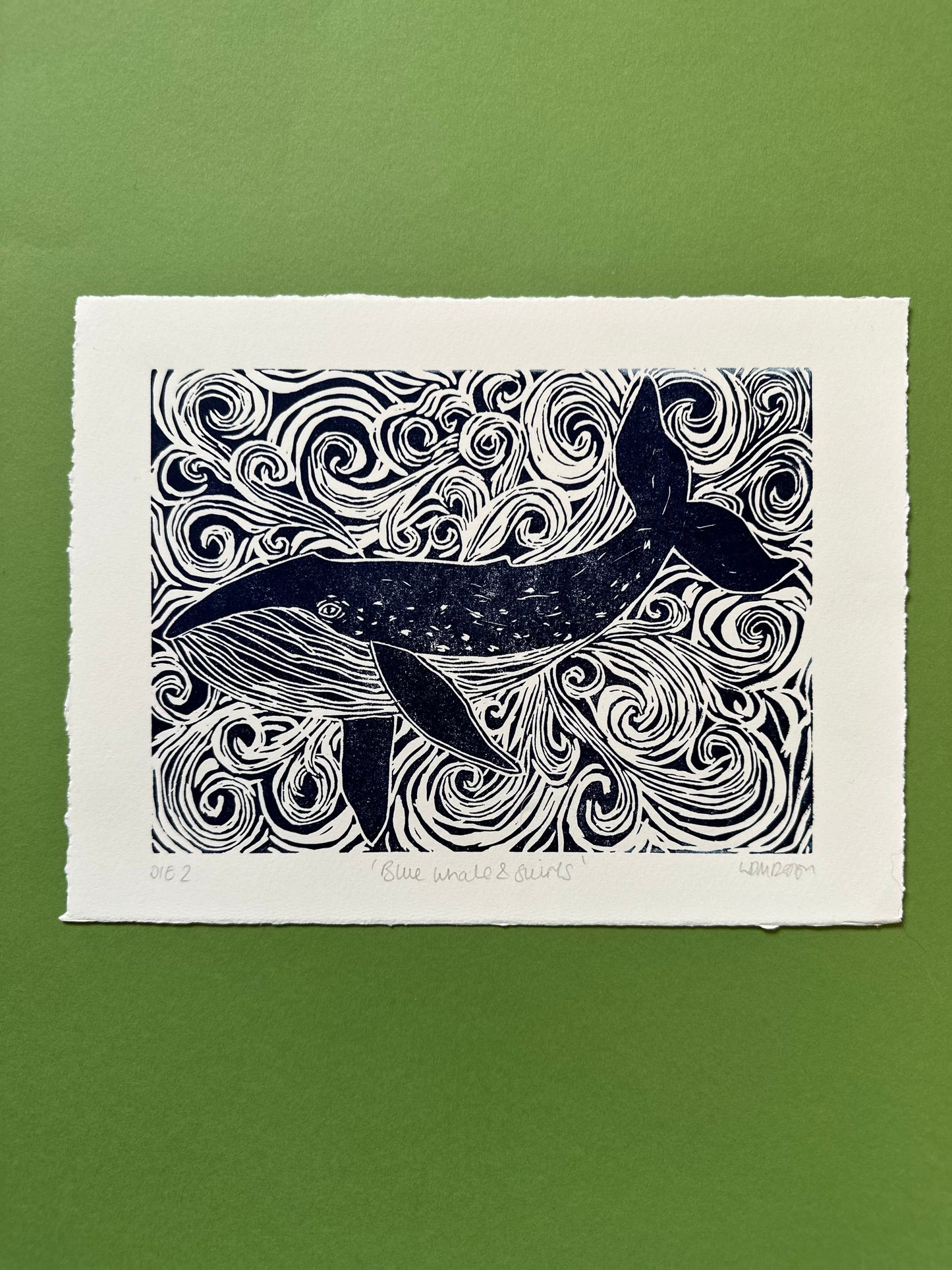 Original Linocut print of ‘Blue Whale & swirls’.