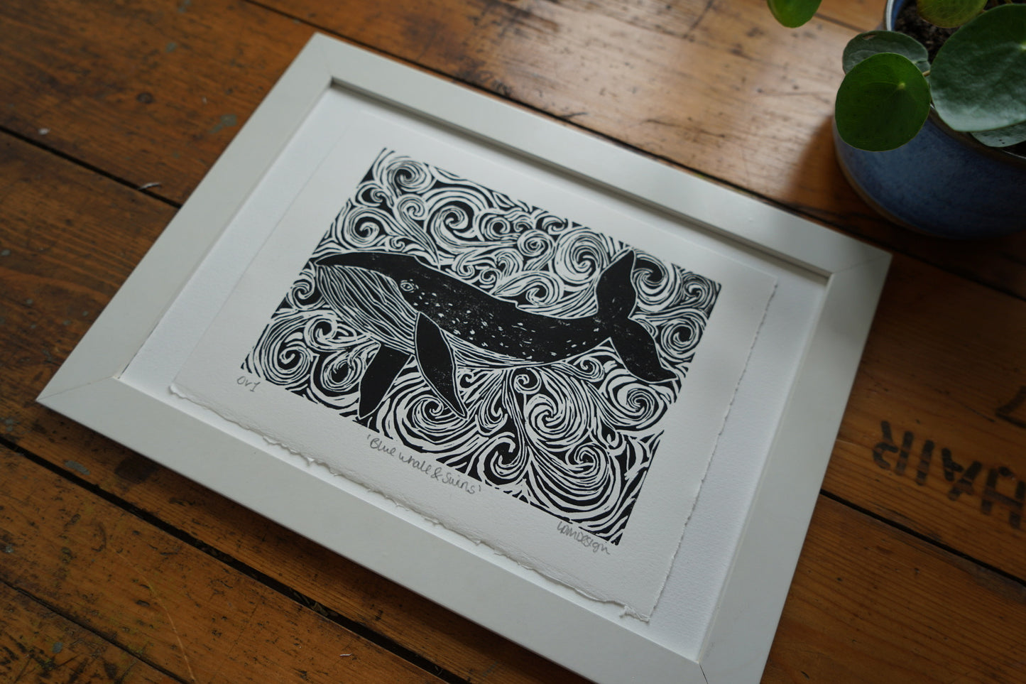 Original Linocut print of ‘Blue Whale & swirls’.