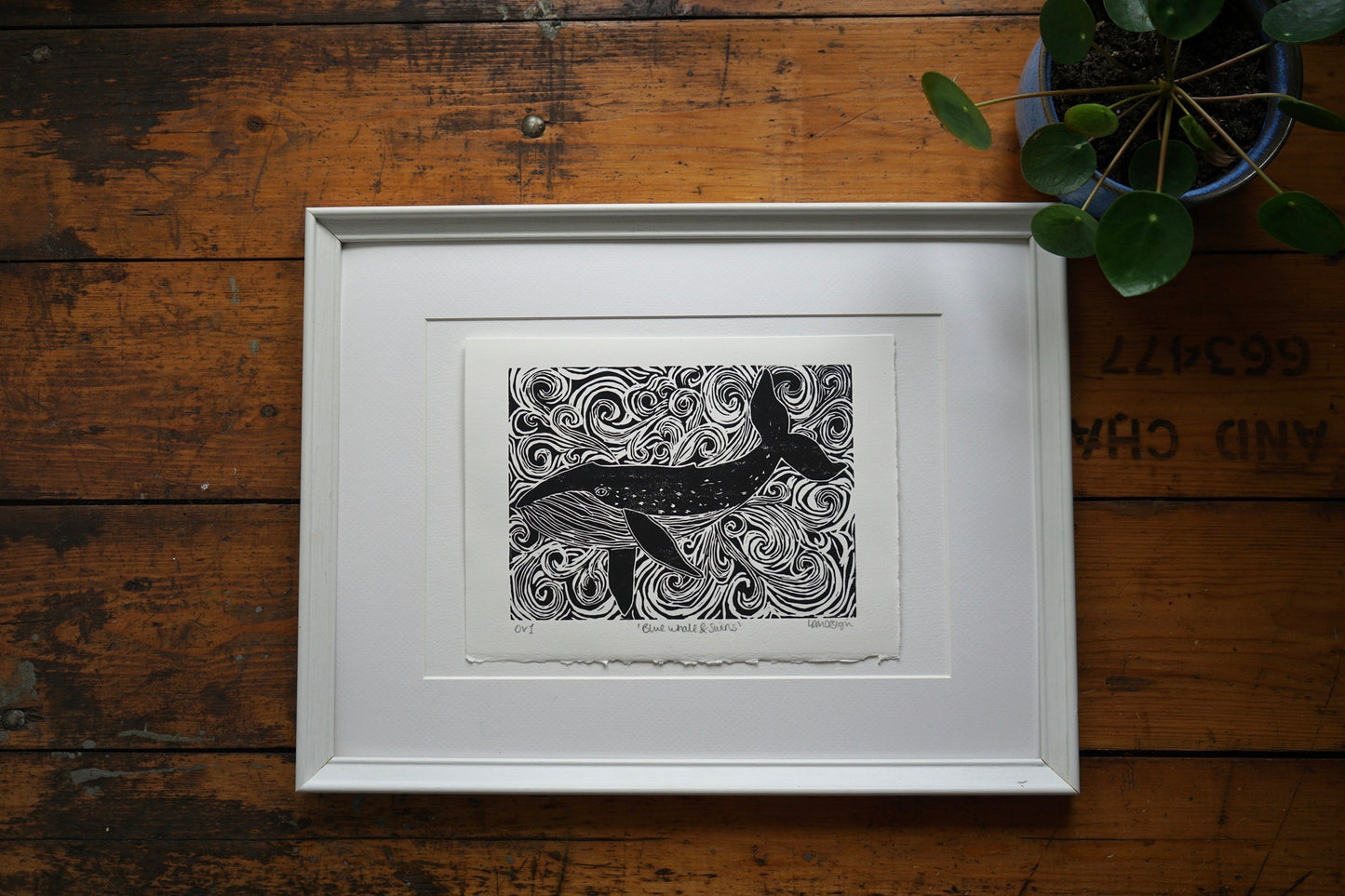 Original Linocut print of ‘Blue Whale & swirls’.